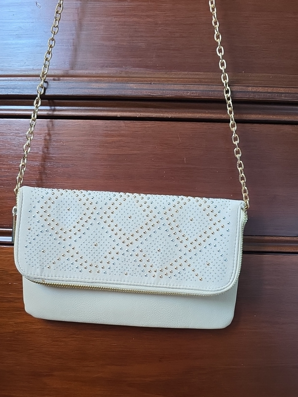 Elegant Stud-Embellished Cream Crossbody Bag with Gold Chain